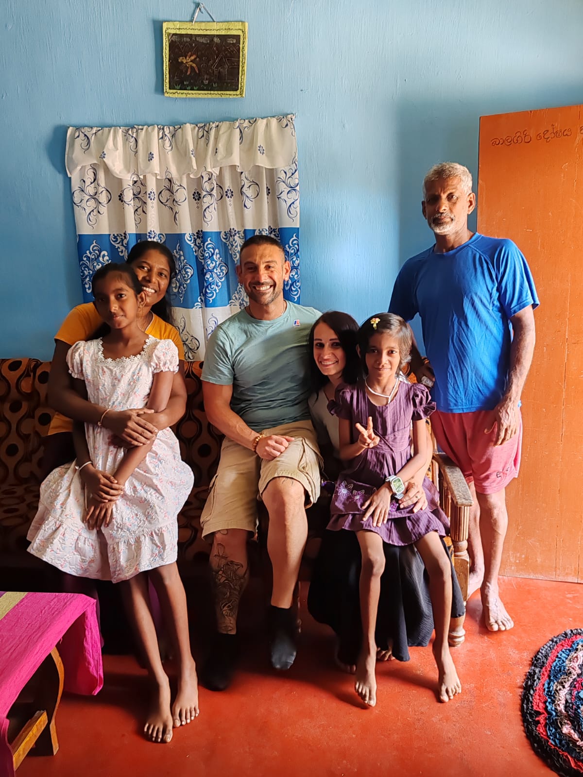Travelers welcomed into a Sri Lankan family home during a Kandy village walk